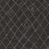 Close-up of Brimbank Premium Rug. Black wool rug with ivory diamond trellis pattern. Hand-loomed texture. Swatch