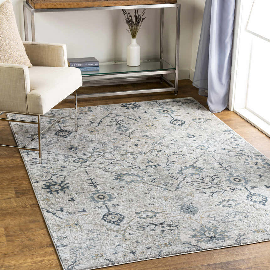 Living room scene with Barkisland Thick Luxe Oushak Rug in deep teal and beige, styled with a linen chair and modern console table. Roomscene-Rectangle