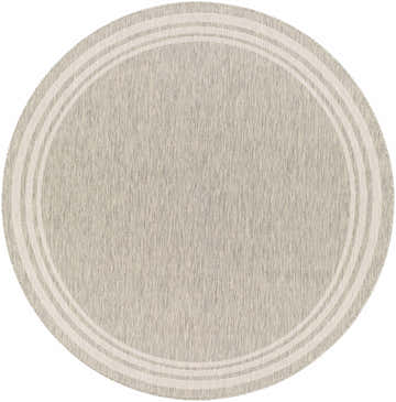 Close-up of a round Burradoo Bordered Area Rug. Beige rug with a light beige striped border. Machine woven polypropylene. Design-Round-67