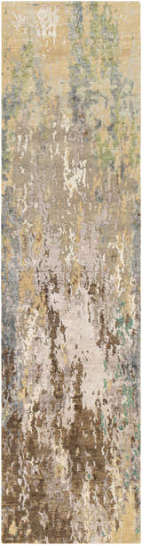 Close-up of the Bued Handmade Wool-Blend Rug. Abstract design in beige, brown, gray, teal, and ivory hues. Hand-knotted texture. Design-Runner-2610