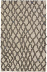 Close-up of Clare Area Carpet; charcoal shag diamonds on a medium gray wool, hand-woven rug. Design-Rectangle