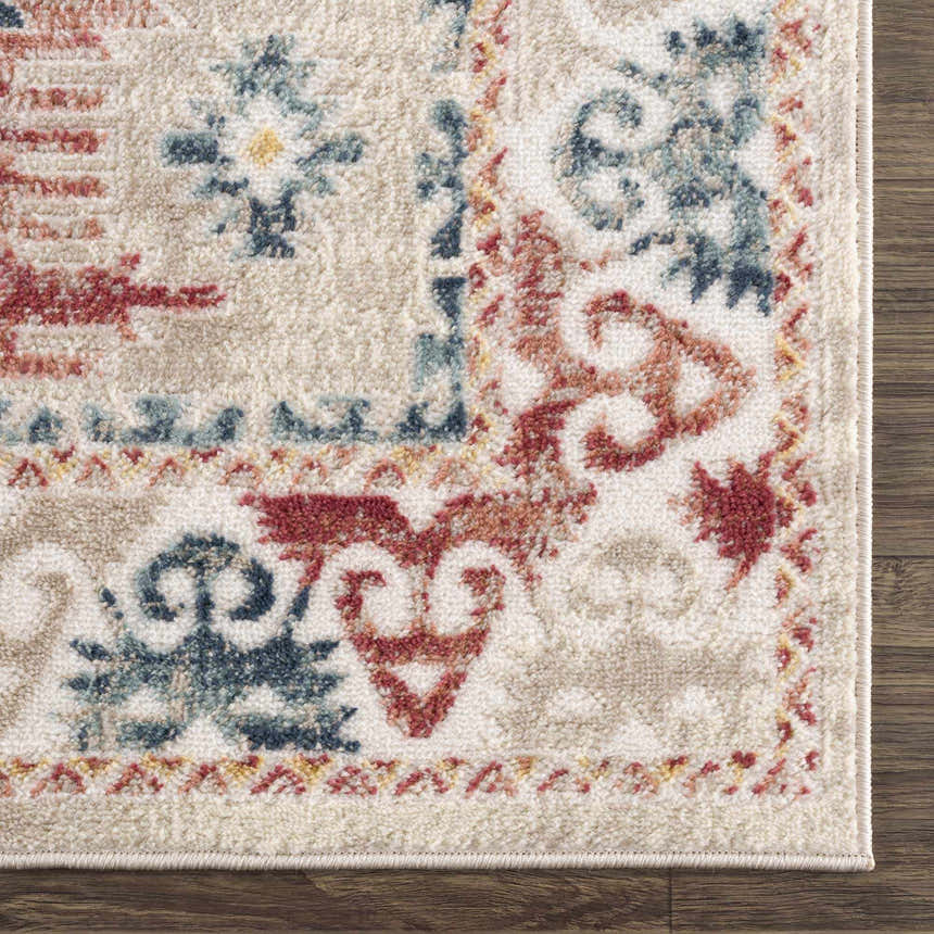 Close-up of Bindi Blue & Rose Area Rug showing its Southwestern pattern, blue and rose colors, and soft texture. Swatch