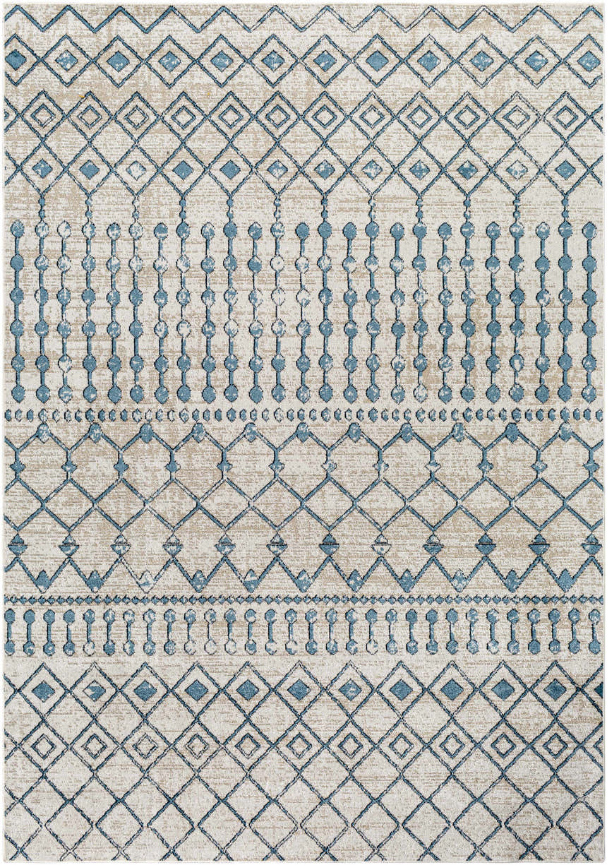 Close-up of the Cabognon Washable Area Rug. Features a geometric pattern in blue, ink blue, light beige, and light gray. Design-Rectangle-537
