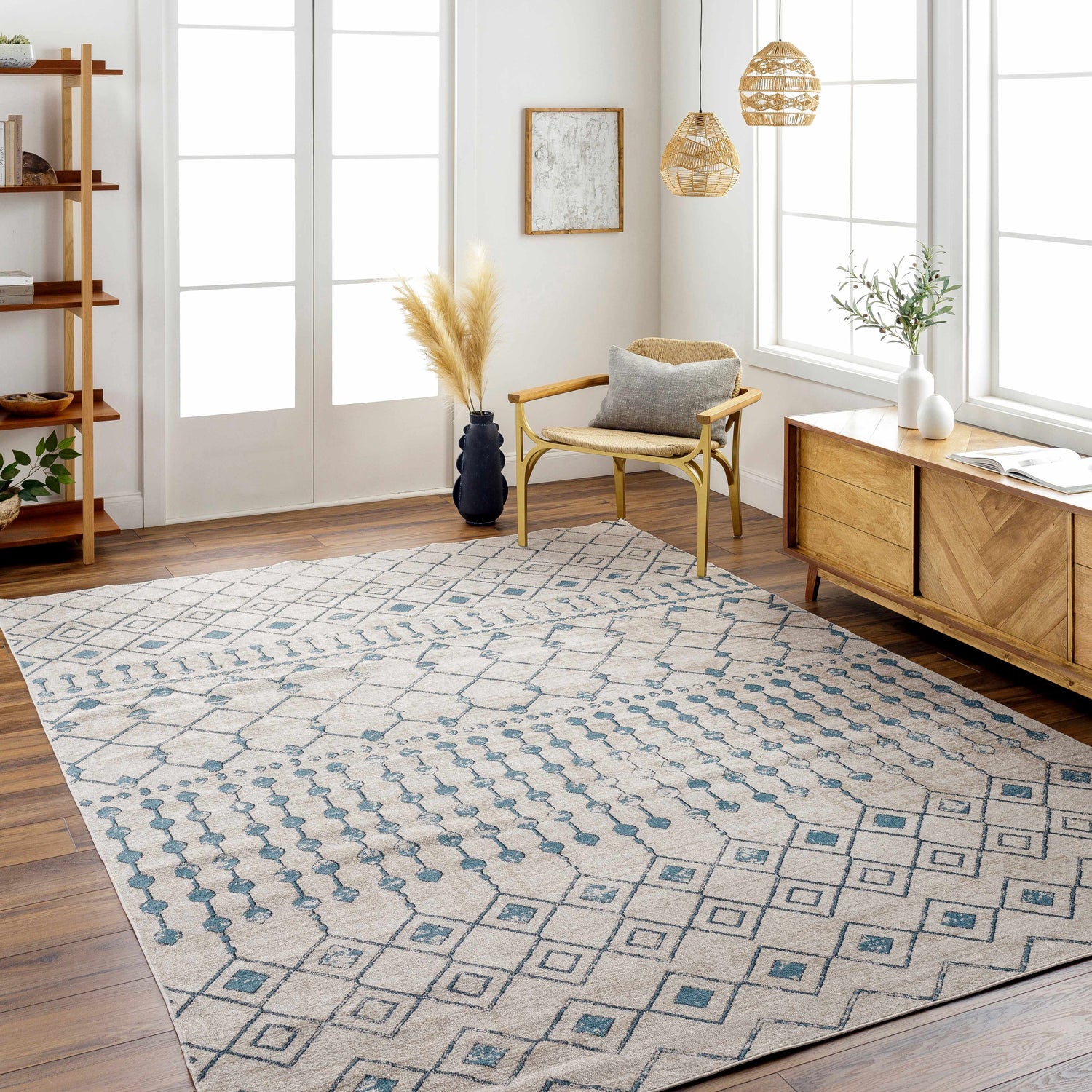 Bright living room with blue geometric Cabognon Washable Area Rug, wood floors, and farmhouse decor. Roomscene-Rectangle