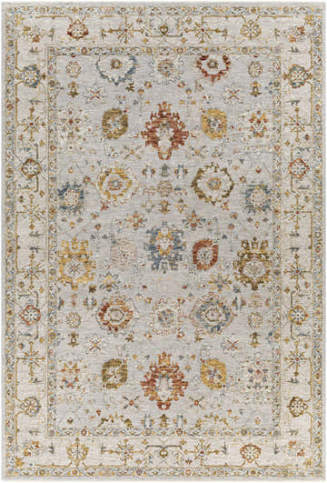 Close-up of the Calingcuan Luxe Oushak Rug. Features a traditional floral pattern in brick red, cream, denim, and mustard on light gray. Design-Rectangle-6796