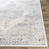 Close-up of the Caloundra Area Rug showing a traditional oriental pattern in charcoal, gray, light gray, and white. Front