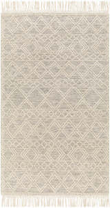 Close-up of the Cameo Scandi Wool Rug. Bone and gray geometric pattern with fringe detail. Farmhouse style. Design-Rectangle-58
