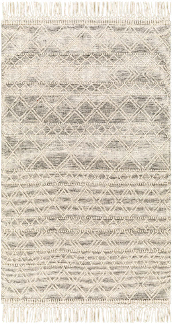 Close-up of the Cameo Scandi Wool Rug. Bone and gray geometric pattern with fringe detail. Farmhouse style. Design-Rectangle-58