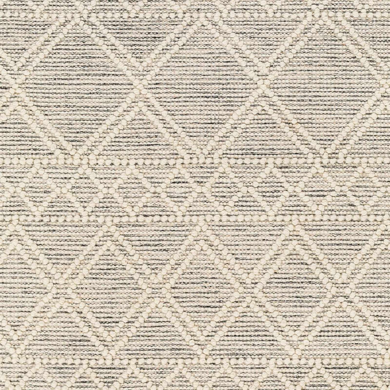 Close-up of Cameo Scandi Wool Rug. Bone geometric diamond pattern on a cloud gray and dark gray hand woven texture. Swatch