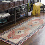Entryway scene with Camperdown Area Rug. Burnt orange, cream, and blue oriental rug on wood floor with console table. Roomscene-Runner