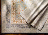 Close-up of the Camrose Thick Luxe Statement Rug showing the traditional pattern, brick red, charcoal, and light beige colors. Styleshot