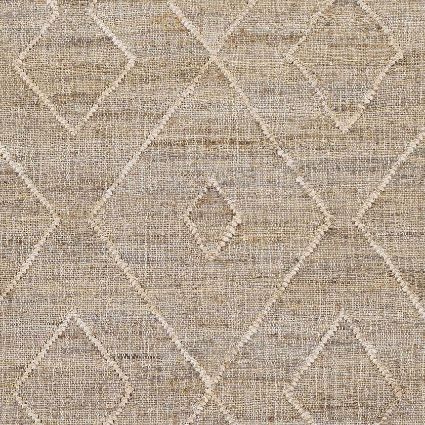 Close-up of the hand-woven Carine Jute Area Rug, featuring a beige diamond pattern on natural jute. Bohemian style. Swatch