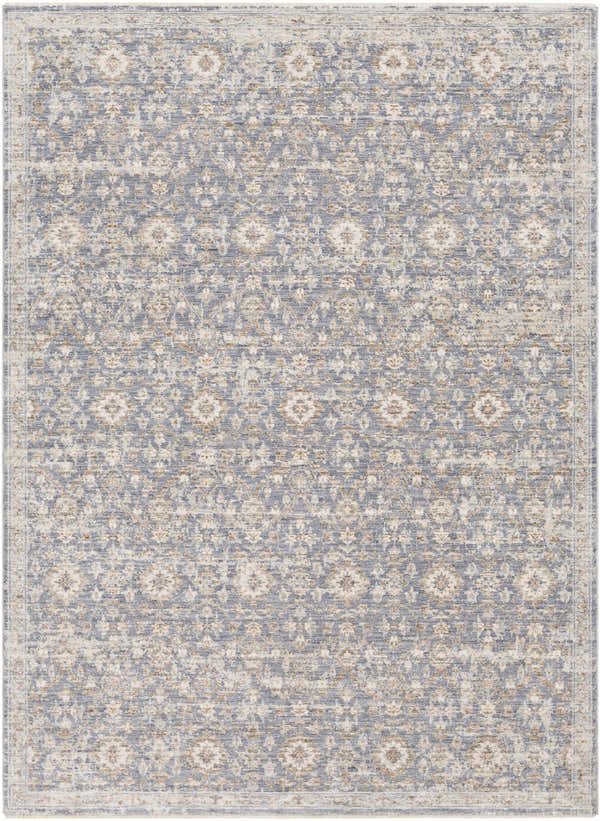 Close-up of the Carlton Area Rug, featuring a traditional floral pattern in denim, taupe, and cream hues. Design-Rectangle-582