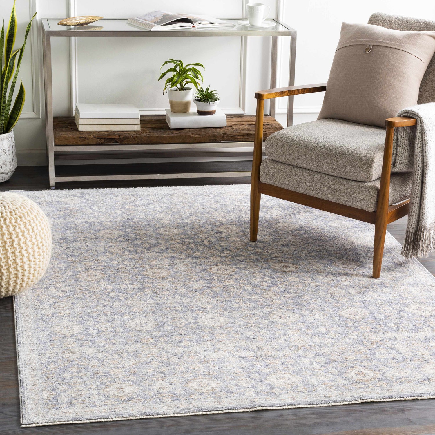 Living room scene with a blush, brown, and cream Carlton Area Rug, chair, and console table. Roomscene-Rectangle