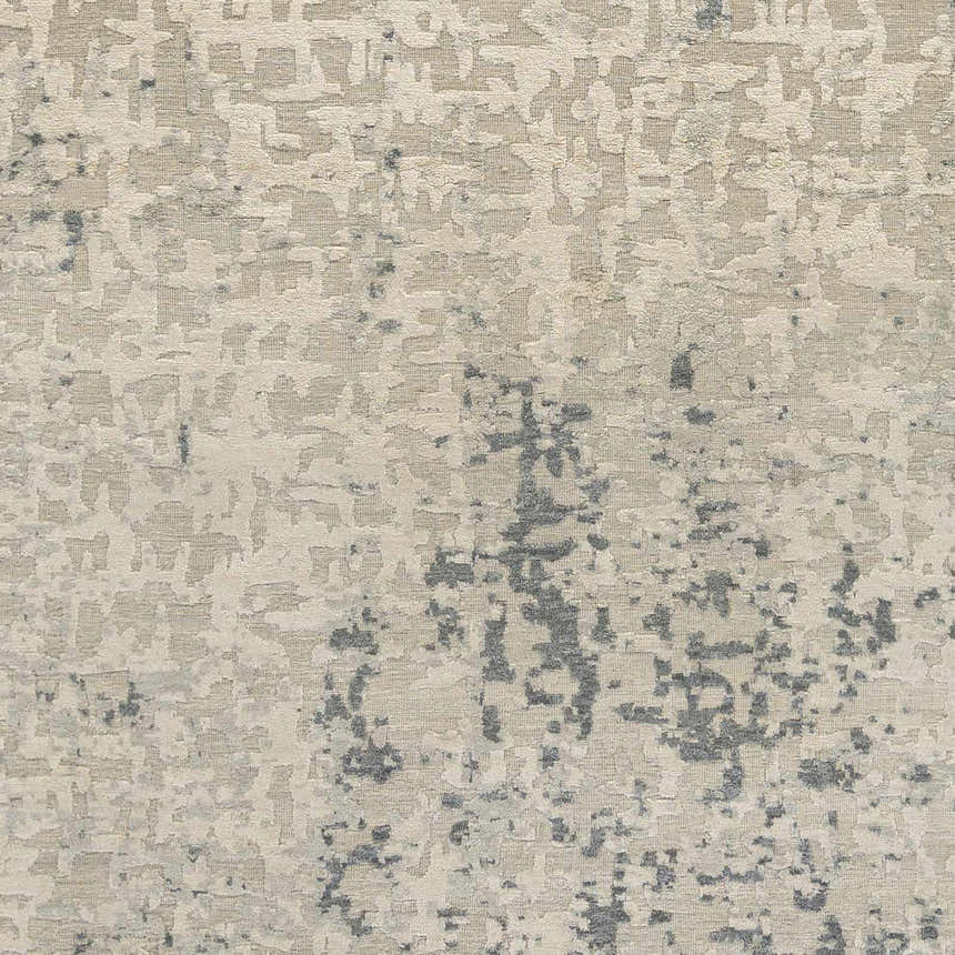 Close-up of the Cayuga Area Rug showing its hand-knotted silk texture and contemporary dark blue, sage, and off-white design. Swatch