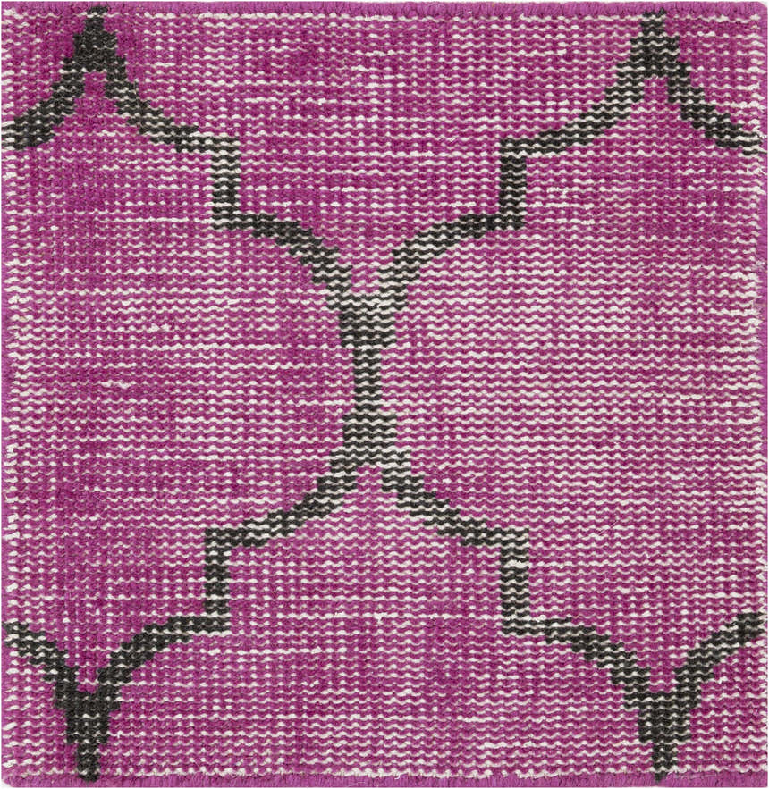 Close-up of the hand-knotted Cedarburg Area Rug. Fuchsia wool with a black geometric pattern. Contemporary style. Texture