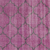Close-up of the fuchsia Cedarburg Area Rug. Black geometric pattern on a textured, hand-knotted wool rug. Clearance item. Swatch