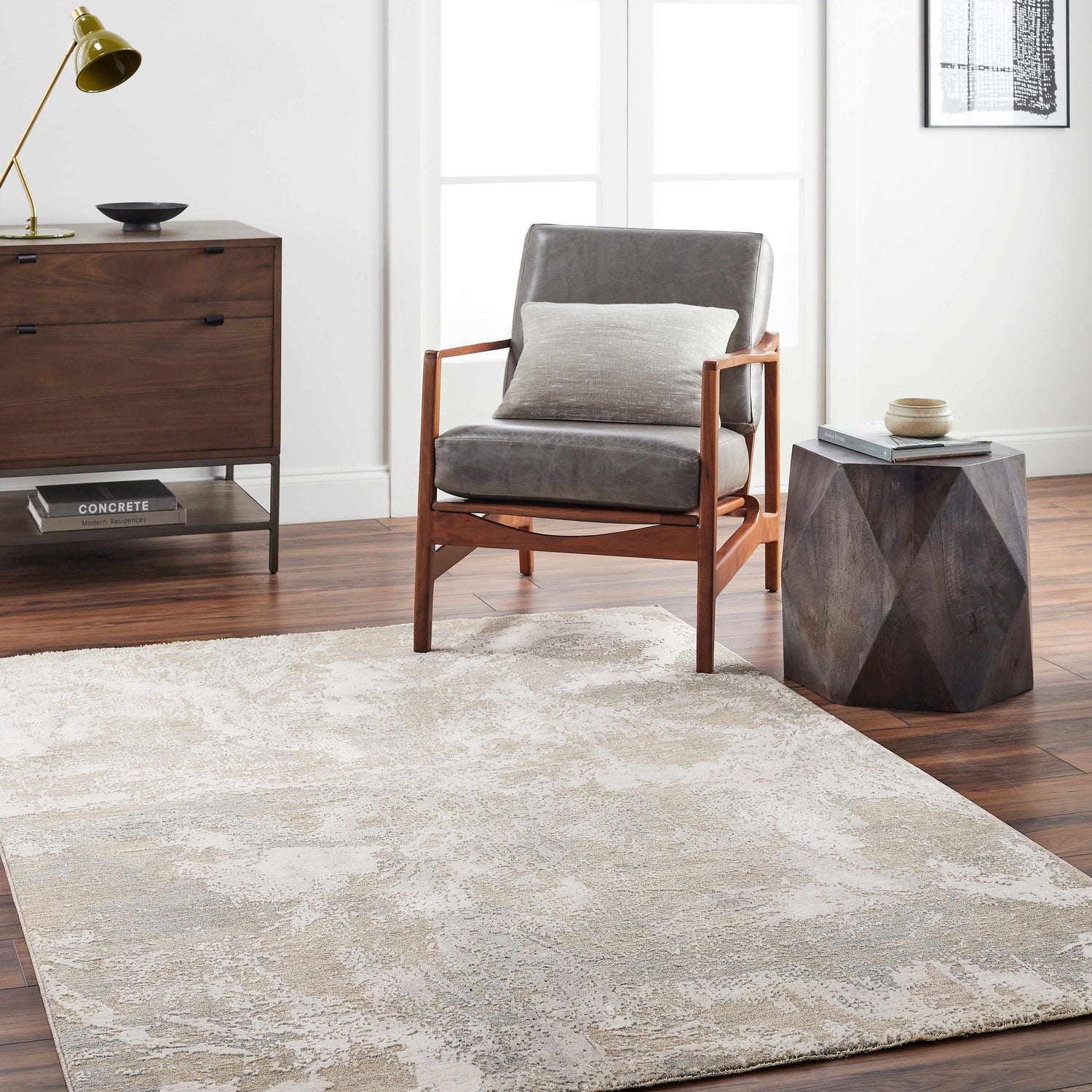 Living room scene with a Cloud Gray Cady Thick Luxe Area Rug, gray chair, and dark wood accents. Roomscene-Rectangle