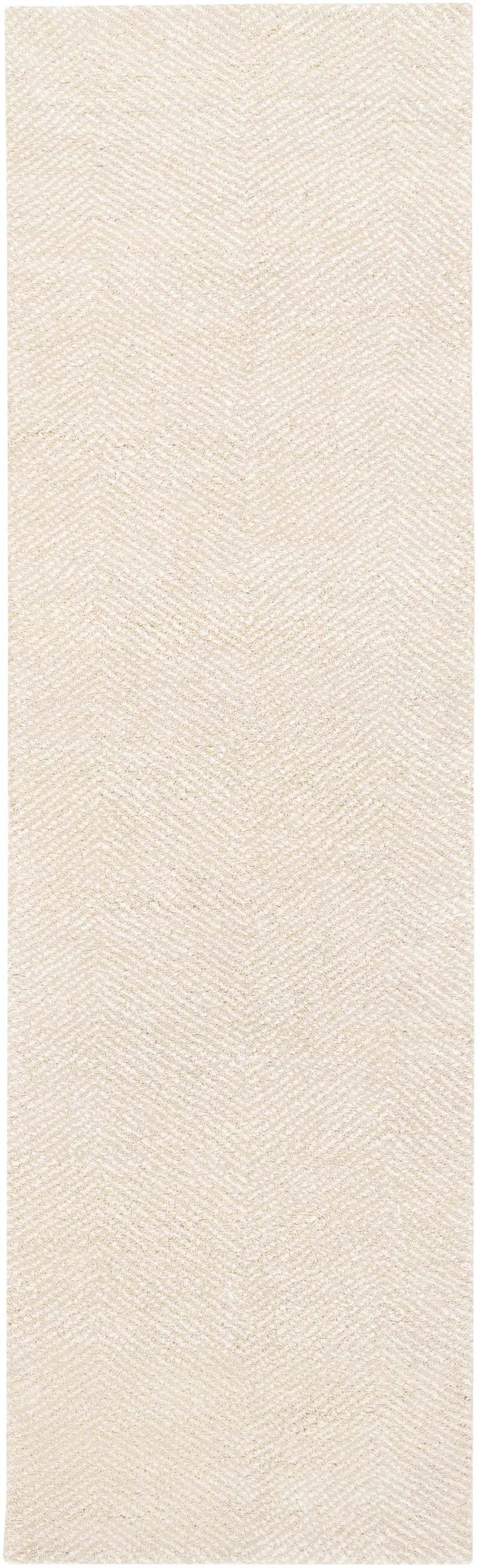 Close-up of the Ceiba Carpet in beige and ivory. Hand-knotted wool and viscose rug with a subtle chevron pattern. Design-Runner-268