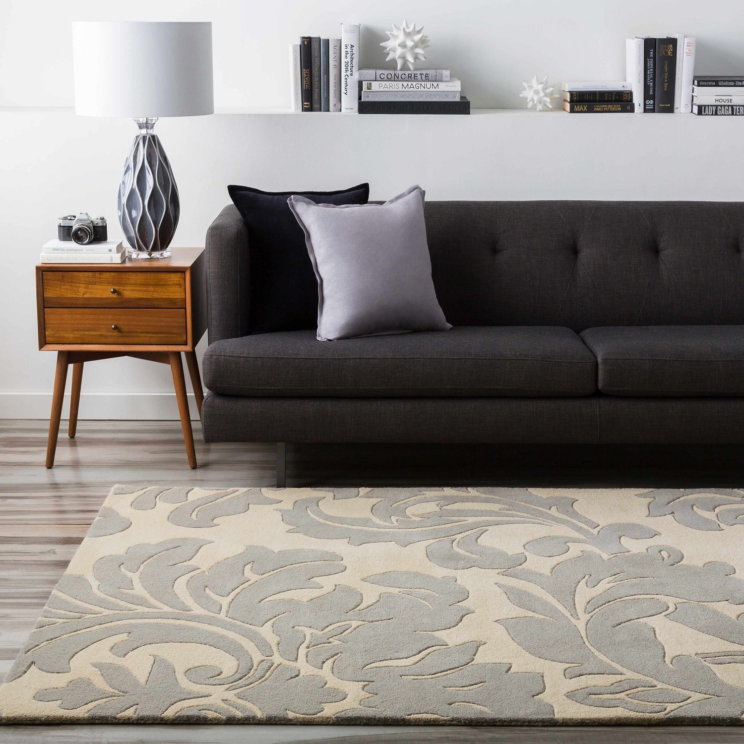 Living room scene with gray sofa and Cementon Area Rug in gray and ivory floral pattern. Roomscene-Rectangle