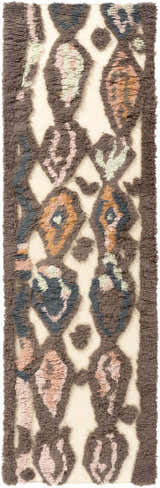 Close-up of the Brown Pink Nila Area Carpet. Hand-woven wool rug with brown, pink, and blue geometric pattern on a beige background. Design-Runner-268