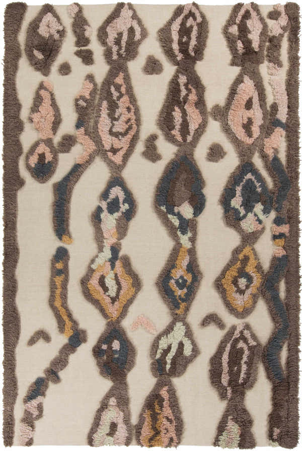 Close-up of the Brown Pink Nila Area Carpet. Hand-woven wool rug with beige background and brown, pink, and blue geometric shag design. Design-Rectangle-58