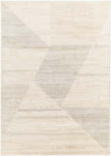 Close-up of the Chizu Geometric Neutral Luxe Rug. Bone and gray tones create a modern geometric pattern. Design-Rectangle-5373