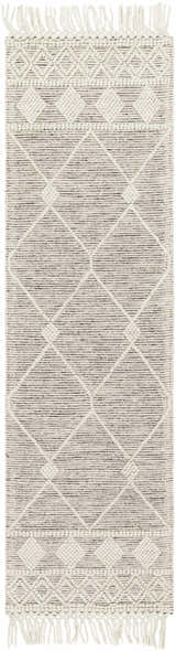 Close-up of the hand woven Hemingway Wool Rug with Tassels. Features a geometric diamond pattern in bone and gray. Design-Runner-2376
