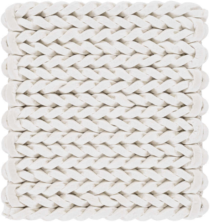 Close-up of the cream Christoval Area Rug showing a hand-woven, chunky braided texture. Swatch