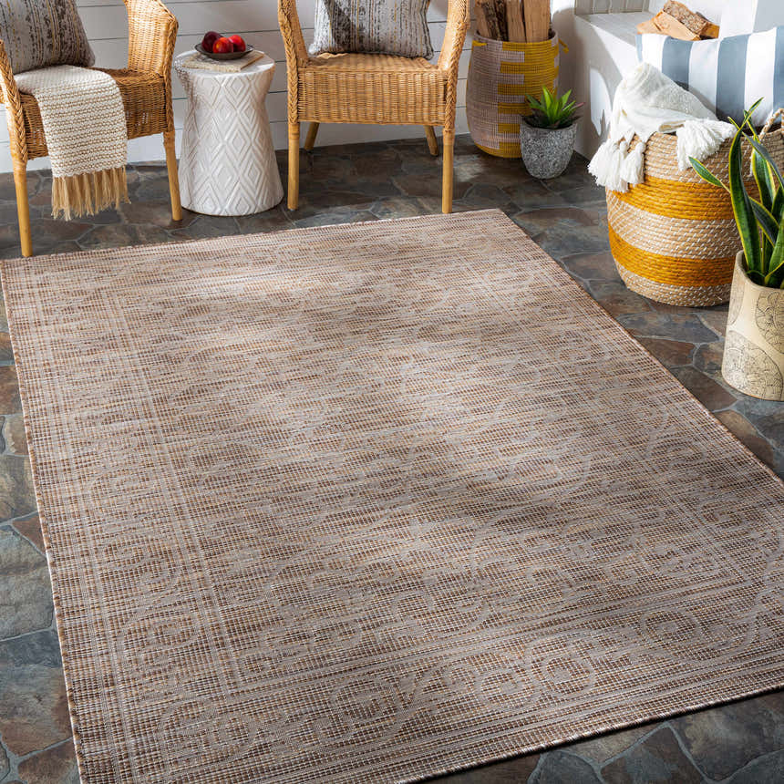 Patio scene with wicker chairs and a Coolville Brown Flatweave Area Carpet. Roomscene-Rectangle