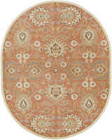 Close-up of the oval Caesar Hand Tufted Burnt Orange 1124 Wool Carpet. Features a floral, oriental pattern in rust, blue, and taupe tones. Design-Oval-810