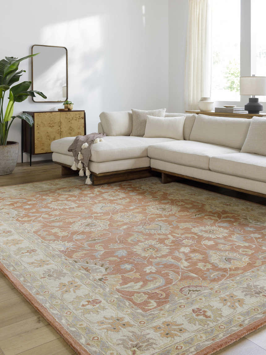 Living room with a Caesar Hand Tufted Burnt Orange rug, cream sectional sofa, and wood accents for a warm, inviting feel. Roomscene-Rectangle