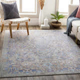Living room scene with Aisha Abstract Premium Sheen Viscose Rug in blue, orange, and purple tones. Roomscene-Rectangle
