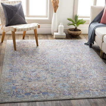 Living room scene with Aisha Abstract Premium Sheen Viscose Rug in blue, orange, and purple tones. Roomscene-Rectangle
