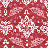Close-up of the hand-woven Cook Area Rug. Contemporary design in blush, red, pink, cream, and purple. 100% cotton texture. Swatch