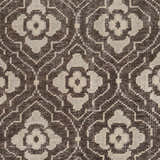 Close-up of the Claysville Area Rug. Beige and dark brown floral medallion pattern on a hand-knotted wool rug. Swatch
