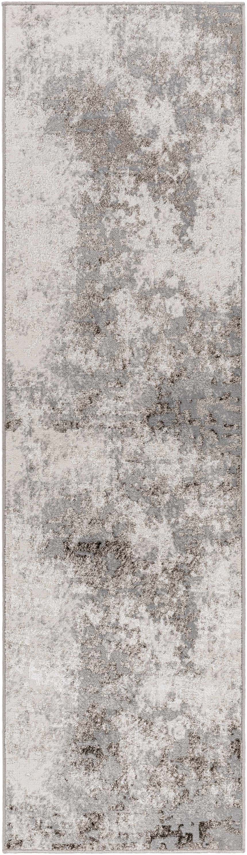 Close-up of a Calabasa Area Rug. Contemporary design in charcoal, gray, and light gray. Abstract pattern. Design-Runner