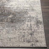 Close up of the charcoal and gray Calabasa Area Rug showing the contemporary pattern and texture. Front