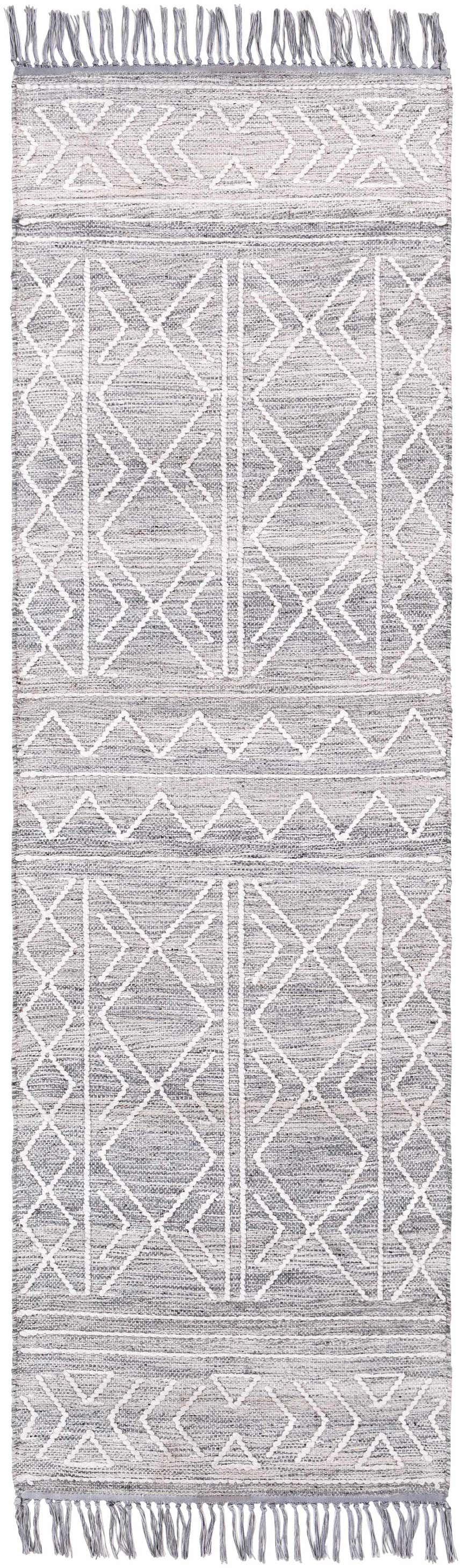 Close-up of Gray Clintwood Wool Tassel Carpet. Hand-woven rug with charcoal, cream, and white geometric pattern and tassels. Design-Runner-268