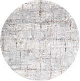 Close-up of round Concordia Faux Silk Rug. Abstract pattern in gray, off-white, navy, and burnt orange hues. Design-Round-710