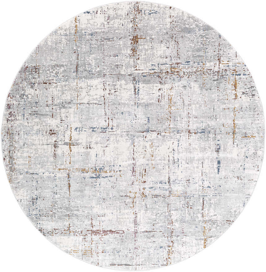 Close-up of round Concordia Faux Silk Rug. Abstract pattern in gray, off-white, navy, and burnt orange hues. Design-Round-710