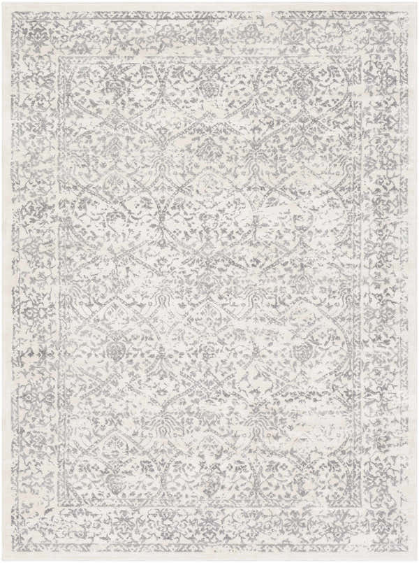 Close-up of the Comstock Area Rug. Bohemian style with charcoal and off-white floral pattern. Machine woven polypropylene rug. Design-Rectangle-5371