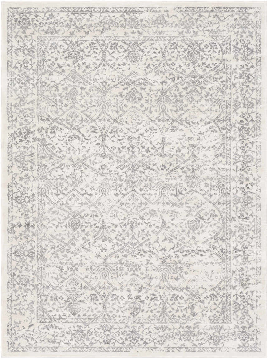 Close-up of the Comstock Area Rug. Bohemian style with charcoal and off-white floral pattern. Machine woven polypropylene rug. Design-Rectangle-5371