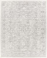 Close-up of the Comstock Area Rug. Bohemian style rug in charcoal, gray, and off-white with a traditional floral pattern. Design-Rectangle-71010