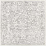 Close-up of the Comstock Area Rug, a machine-woven rug with a traditional gray and off-white floral pattern. Design-Square-710