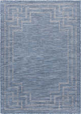 Close-up of the blue Corlette Area Rug, featuring a geometric border pattern and woven texture. Design-Rectangle-537