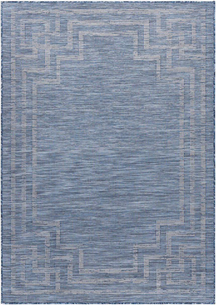 Close-up of the blue Corlette Area Rug, featuring a geometric border pattern and woven texture. Design-Rectangle-537
