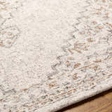 Close-up of the Currimao Area Carpet showing its hand-tufted texture and neutral Persian-inspired pattern. Texture