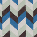 Close-up of the Curtin Carpet, a hand-woven wool rug with a contemporary chevron pattern in blue, navy, sage, and white. Swatch