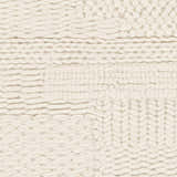 Close-up of the hand woven Cypress Cream Textured Wool Rug, showing the chunky knit texture and cream color. Swatch
